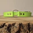 Bright lime green Centre O-Ring Collar for gundogs, displaying the rollover safety design with independent strap sections and metal O-ring detail.