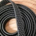 Close-up super grip BioThane longline showing showing grip detail and layered construction against wooden background.