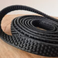 Close-up super grip BioThane longline showing dimpled surface texture and layered construction.