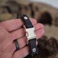 biothane quick release buckle on black BioThane dog collar strap with metal fittings.