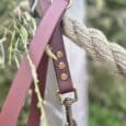 Pink and burgundy handmade BioThane dog collar with brass fittings and rope lead attachment.