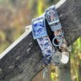 Coastal-printed BioThane collar with matching personalised resin tag featuring nautical design and brass hardware.