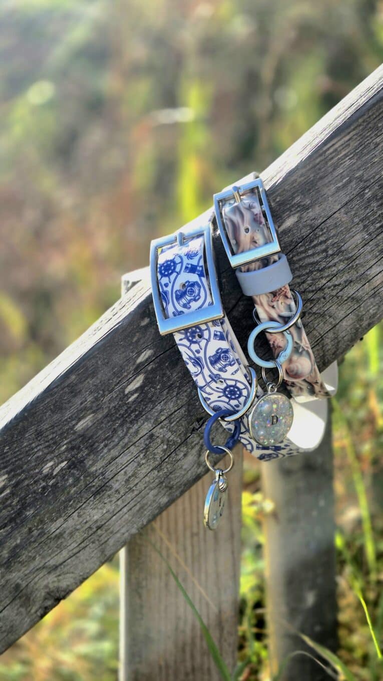 Coastal-printed BioThane collar with matching personalised resin tag featuring nautical design and brass hardware.