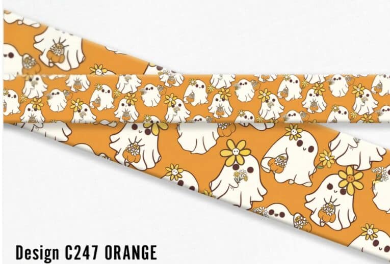 Cute ghost Halloween print dog collar in orange with white ghosts, yellow flowers and brown details.
