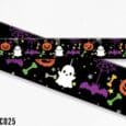 Cute Halloween-themed dog collar design featuring jack-o'-lanterns, ghosts, bats, spiders and bones on black