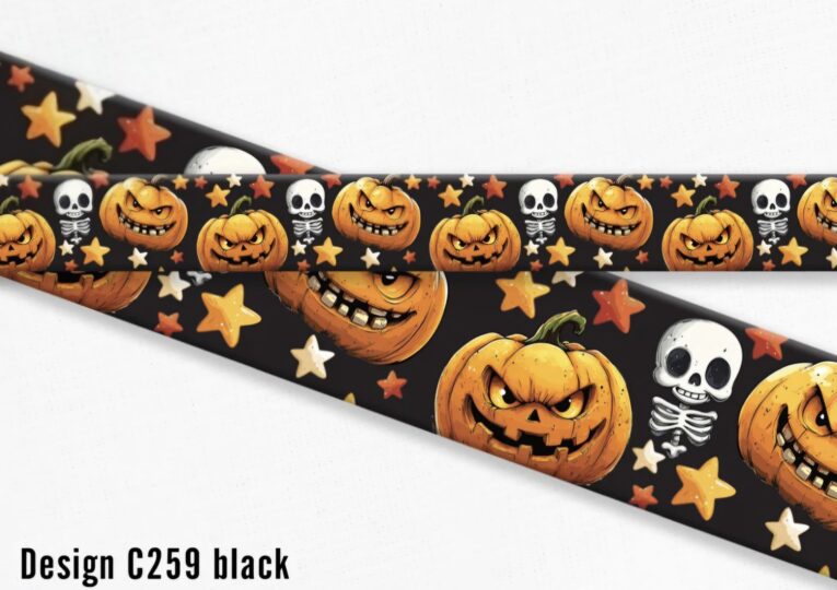 Halloween-themed printed BioThane dog collar featuring jack-o'-lantern pumpkins, skulls and stars on black background